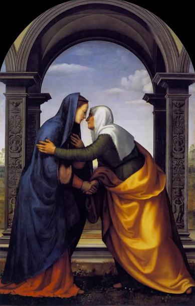 A colorful 1503 painting in which Mary stands, leaning into the face a shorter Elizebeth. Two of their hands are clasped, while Elizabeth's other hand reaches to pull Mary into an embrace and Mary rests a hand on her chest as if catching her breath.
